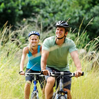 Couple riding bikes together.